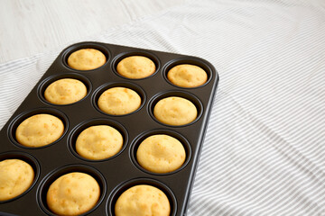Homemade Cornbread Muffins, side view. Copy space.