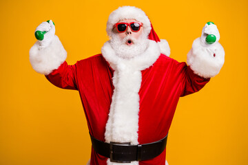 Portrait of his he nice attractive amazed wondered Santa doing workout fat burn weightloss activity health care isolated bright vivid shine vibrant yellow color background
