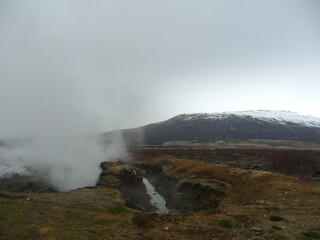 Hiking in the wild and dramatic landscapes of Iceland's fjords, volcanoes, mountains, geysers and waterfalls