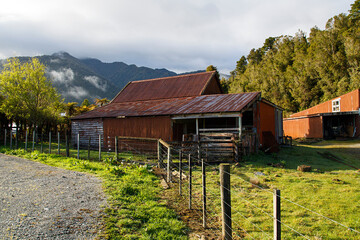 Farm outbuildings in a rural location in Westland, New Zealand.