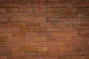 Red brick wall abstract background texture.