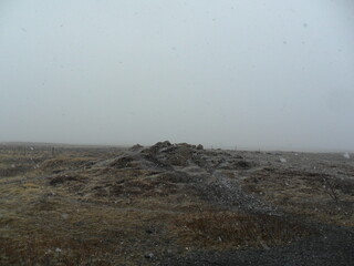 Hiking in the wild and dramatic landscapes of Iceland's snowy mountains, volcanoes, geysers, waterfalls and hot springs