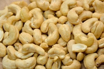 Cashew nuts. Cashew kernels. Clean organic nuts retro background. Organic healthy food.