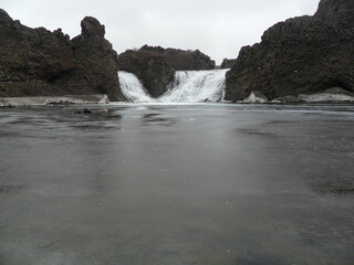 Fototapeta premium Hiking in the wild and dramatic nature of Iceland's fjords, volcanoes, snowy mountains, waterfalls and geysers