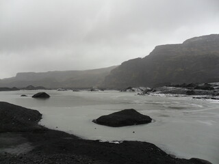 Hiking in the wild and dramatic nature among volcanoes, geysers, waterfalls, snowy mountains and hot springs in Iceland