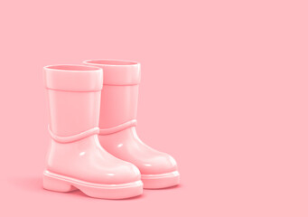Pink rubber boots isolated on pink background. Clipping path included