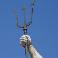 Fototapeta premium Trident as a symbol of the power of the god of the seas and oceans Neptune (Poseidon, Triton).