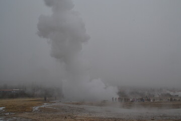 Hiking in the wild and dramatic nature of volanoes, snowy mountains, waterfalls, geysers and hot springs in Iceland