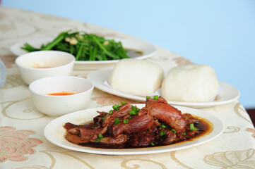 Herb stewed pork legs and mantou are famous dishes of Doi Mae Salong, Thailand.