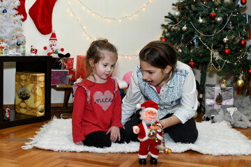 Happy children girls with Christmas gifts. Happy New  Year