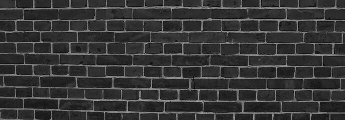 stone wall made of bricks monochrome