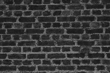 stone wall made of bricks monochrome