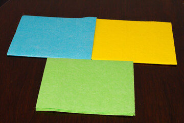 Colored microfiber napkin with dark background, kitchen rag, object