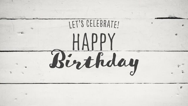 Digital animation of lets celebrate happy birthday text against grey wooden textured background