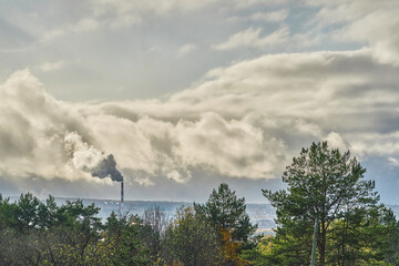 smoke from the chimney over the city