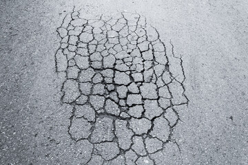 Asphalt broken road crack detail texture background wallpaper