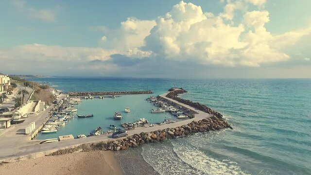 aerial view with a drone of the tourist port called marina of Marinella di Selinunte in Sicily on a cloudy autumn day