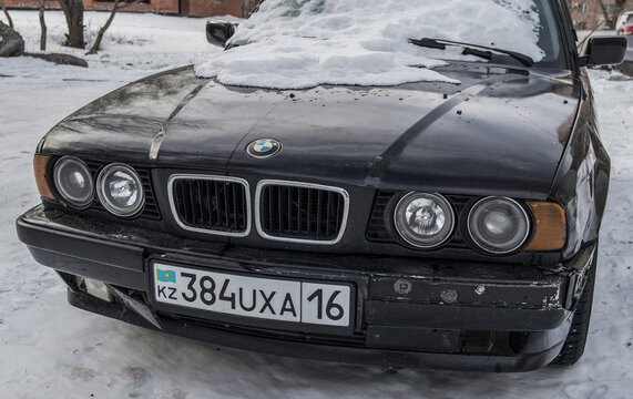 Kazakhstan, Ust-Kamenogorsk, january, 20, 2019: BMW E34 5-series. Old german car. Headlights