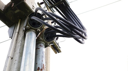 Service entrance cover with wires. Galvanized metal pipe for wiring attached to concrete electric pole on a white background. Close focus and select an object