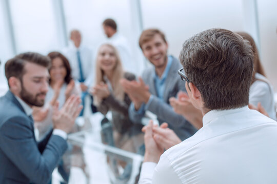 background image business people applauding in the conference room
