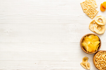 Mix of nuts and dried fruits top view with copy space