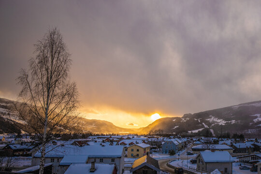 sunset over the village in norway