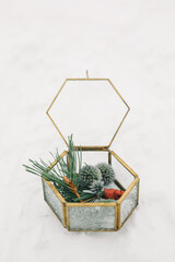 Glass jewelry box for wedding decorations. Fir groom's boutonniere. Wedding winter decor.