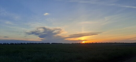 Obraz premium sunset over the river