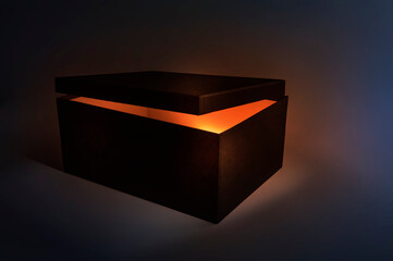 black box with gold light