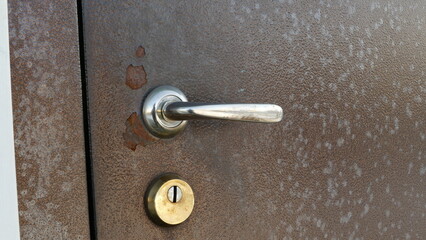 handle and lock of the entrance iron door