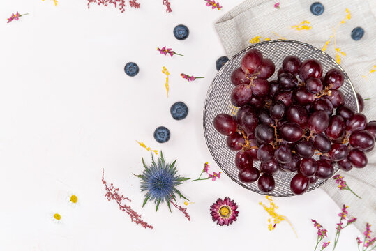 Red Grapes On A Bowl From Above On A Side