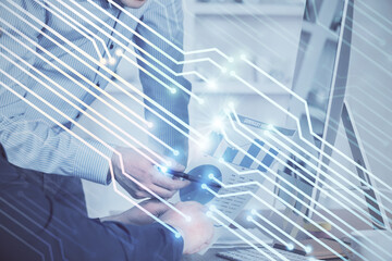 Multi exposure of tech drawings with man working on computer background. Concept of innovation.