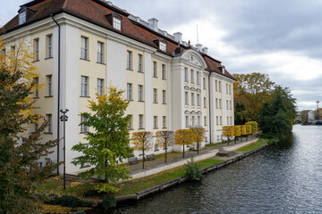 Fototapeta na wymiar Berlin Germany Castle Köpenick palace in old city autumn fall season leaves changing color view from river