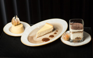 Isolated three Italian dessert on white plate