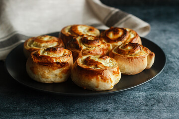 Buns with cottage cheese. Delicious pastries on a plate