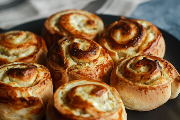 Buns with cottage cheese. Delicious pastries on a plate