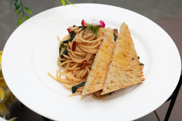 Delicious spaghetti served on a white plate