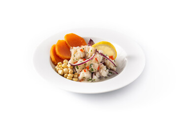 Traditional peruvian ceviche with fish, sweet potato, corn and vegetables isolated on white background