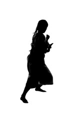 少林寺拳法をする女性のシルエット