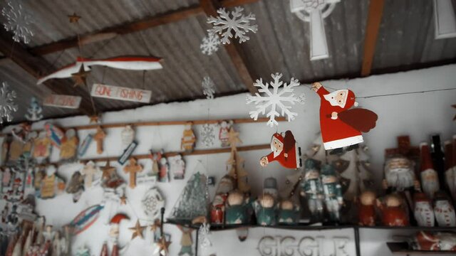 Christmas wooden toys of santa claus hanging in the house