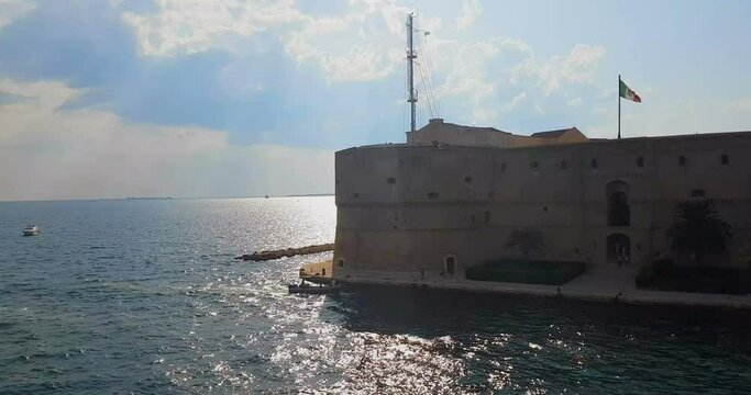 landscape of taranto port in italy with calm sea on daylight