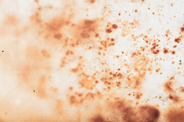 Rusty and dirty metal texture on a white paper sheet