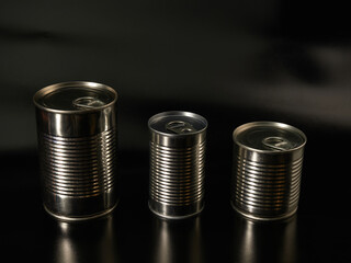 Still life of canned food in different types of cans