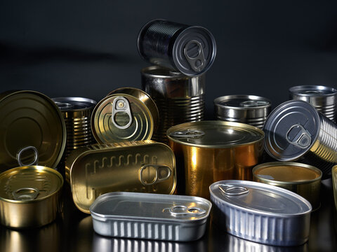 Still life of canned food in different types of cans