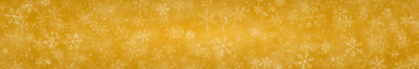 Christmas banner of snowflakes of different shapes, sizes and transparency on yellow background