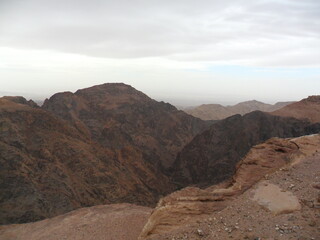 Exploring the archeological site of Petra and the red sandstone landscapes in Jordan