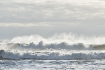Waves crashing at Víkurfjara beach. South Iceland.