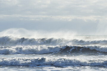 Waves crashing at Víkurfjara beach. South Iceland.