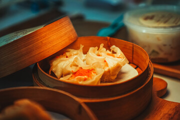 A Shumai in a traditional Chinese dim sum basket