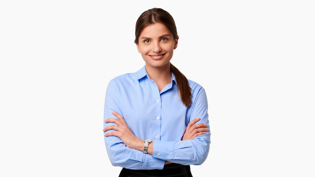 Confident crossed arms business woman in blue shirt on white isolated background